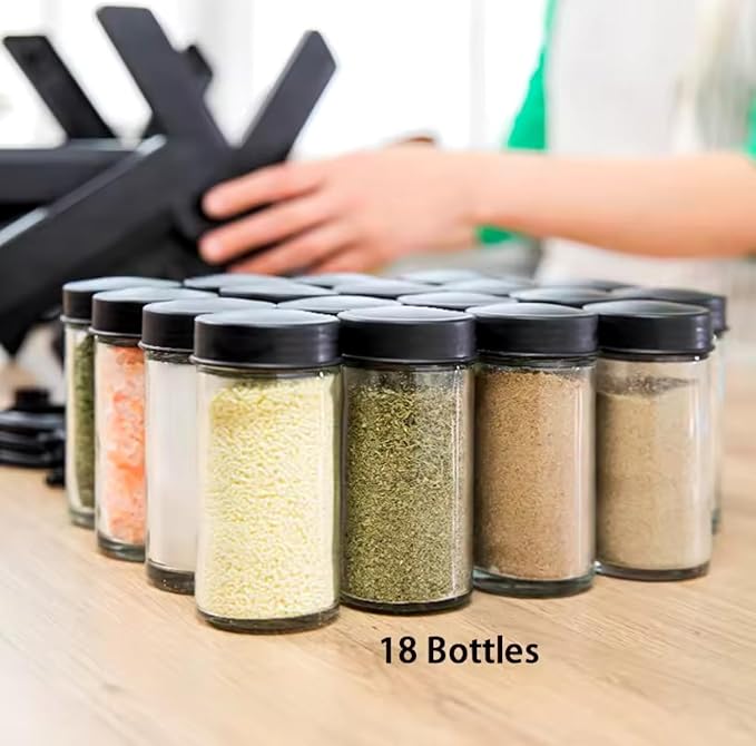 Rotating spice rack set designed to organize and store various spices. This spice rack appears to have a rotating carousel design, allowing easy access to different spices.