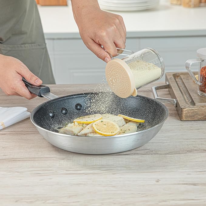 Restaurantware RW Base 10 Ounce Clear Plastic Dredge Spice Shaker 1 Reusable Dry Rub Shaker - Includes Beige Perforated Lid With Handle Clear Polycarbonate Spice Shaker For Fine Seasonings